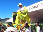 Bishop Paul Donoghue carried in a 'sede gestatoria'