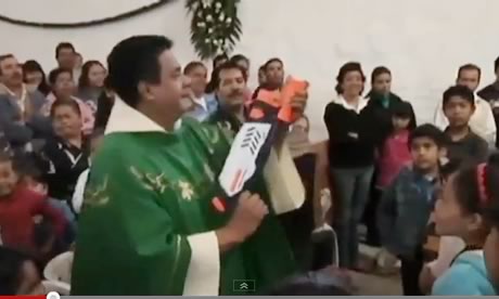 Priest with water gun