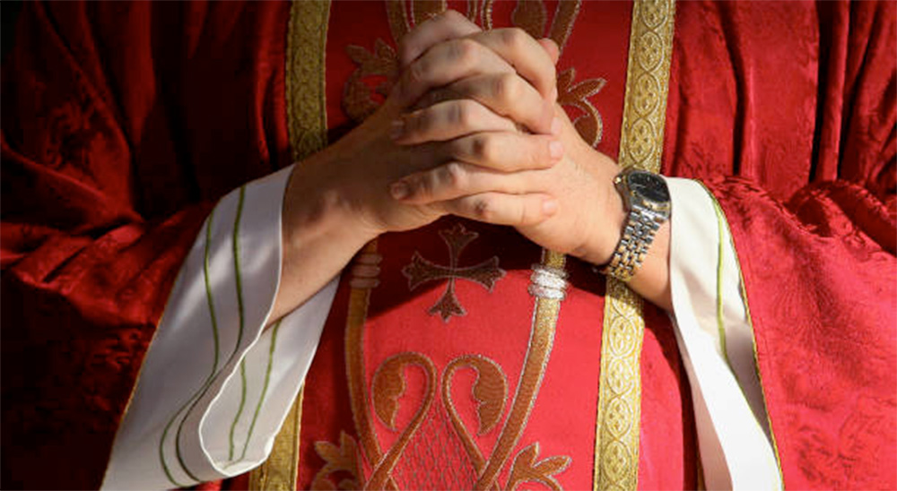 bishop praying