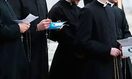 Mexican priests wearing