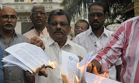 protestors set fire to letter